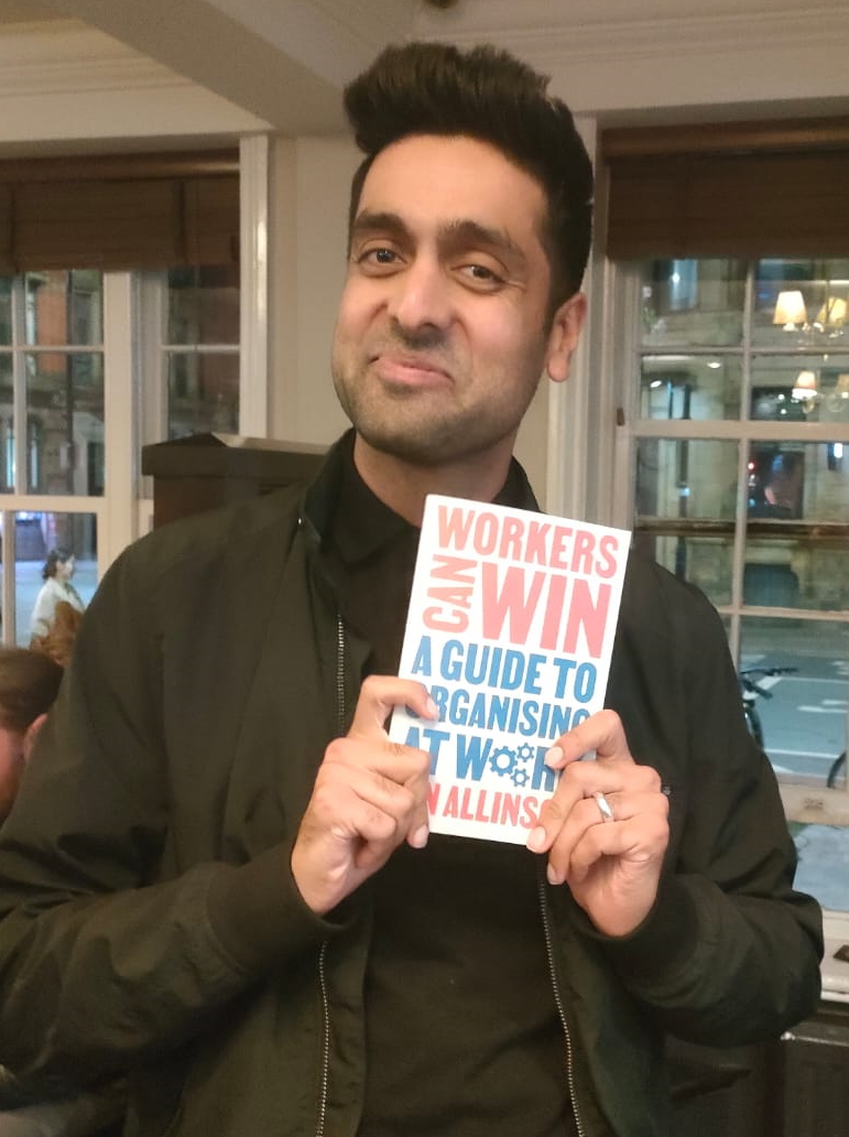 Vik holding the book